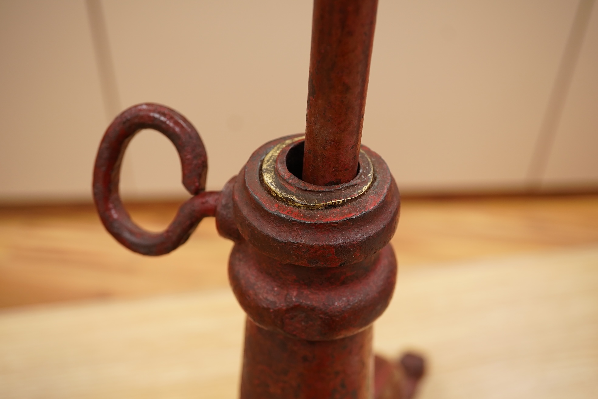A 19th century red japanned (heavy) cast iron telescopic tripod base, 63cm minimum